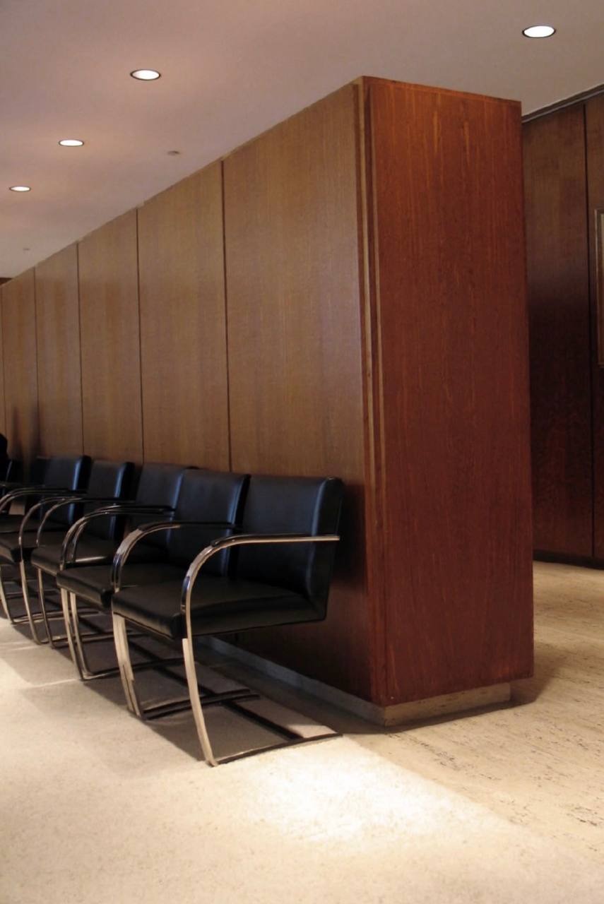 Wood-paneled office corridor