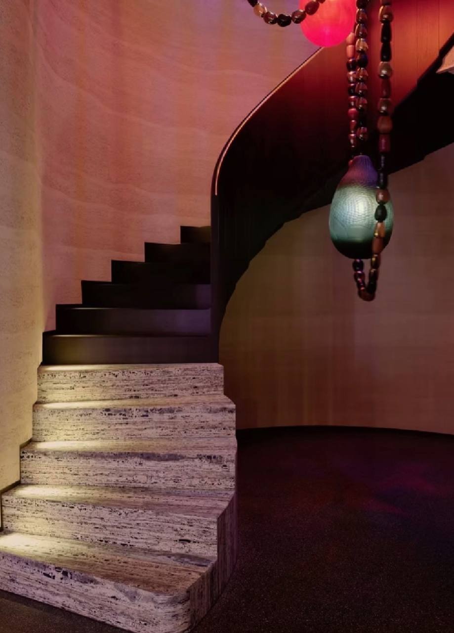 Curved staircase lounge interior